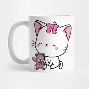 Cute angora cat holds a teddy bear Mug